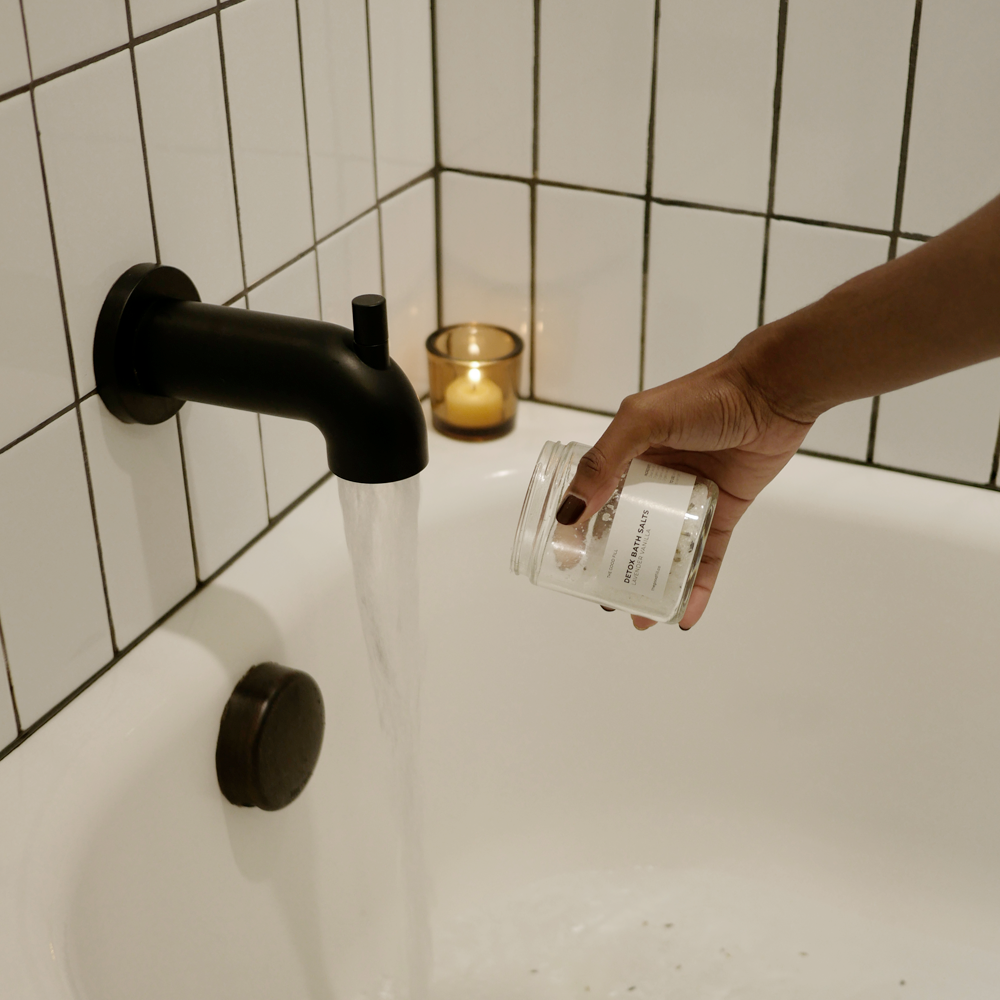 Refillable Detox Bath salts being poured into a bath.