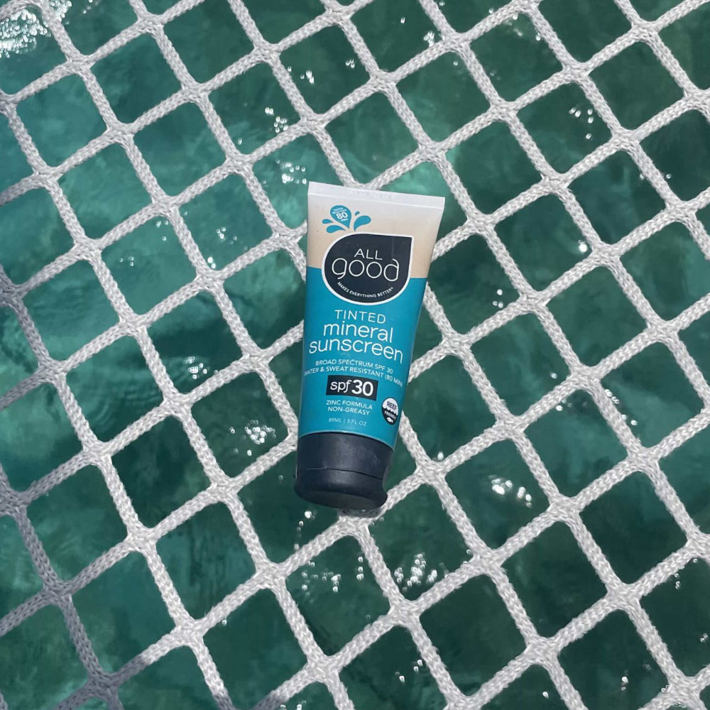 non-toxic tinted mineral sunscreen in a recycled plastic squeeze tube