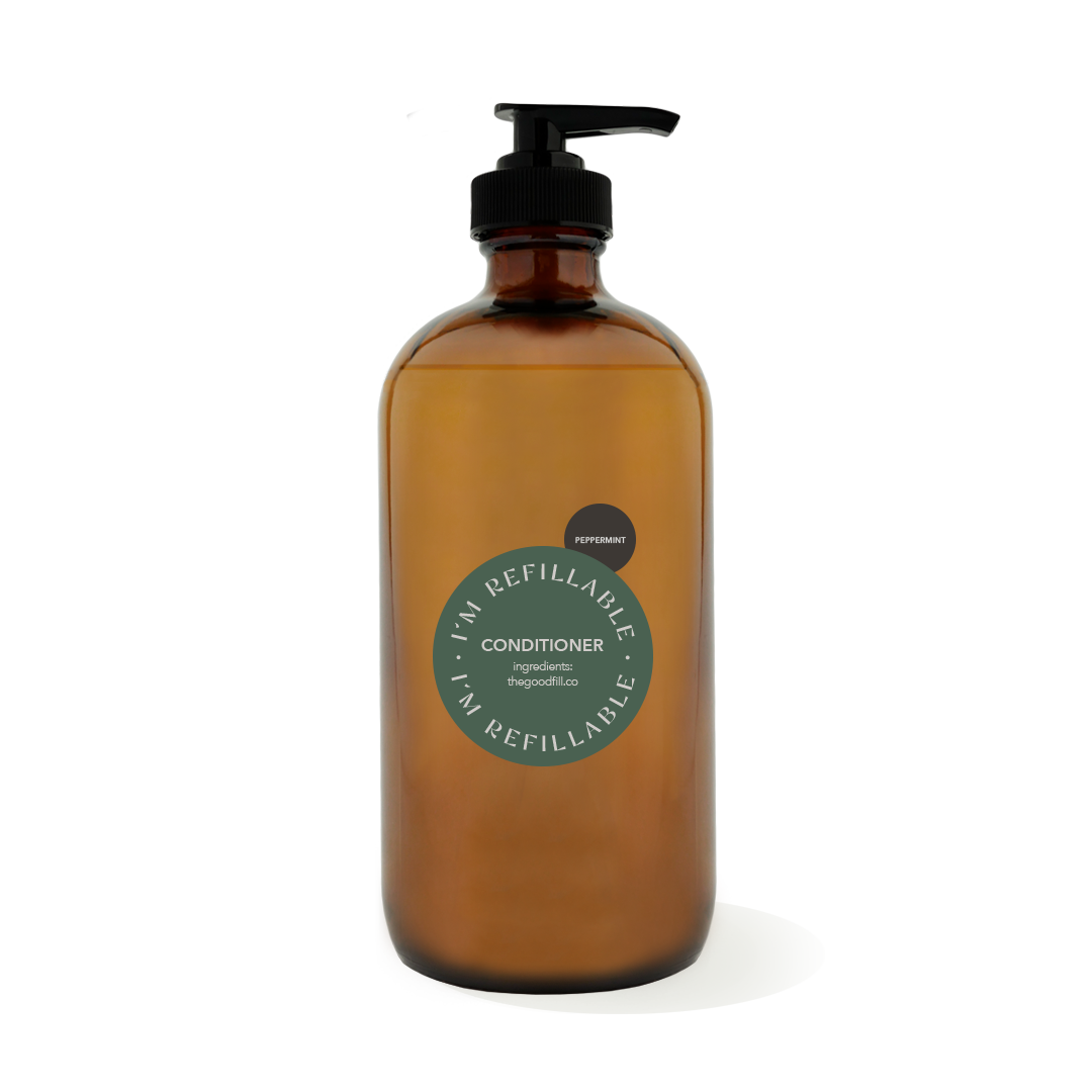 16oz glass amber bottle with a black pump top for zero waste peppermint conditioner refills.