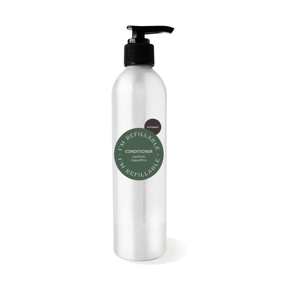9oz aluminum bottle with a black pump top for zero waste peppermint conditioner refills.