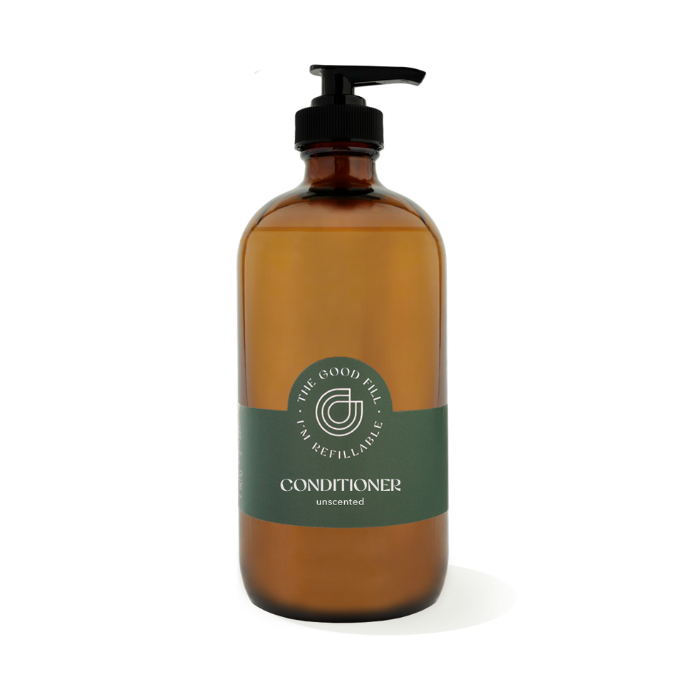 16oz glass amber bottle with a black pump top for zero waste unscented conditioner refills.