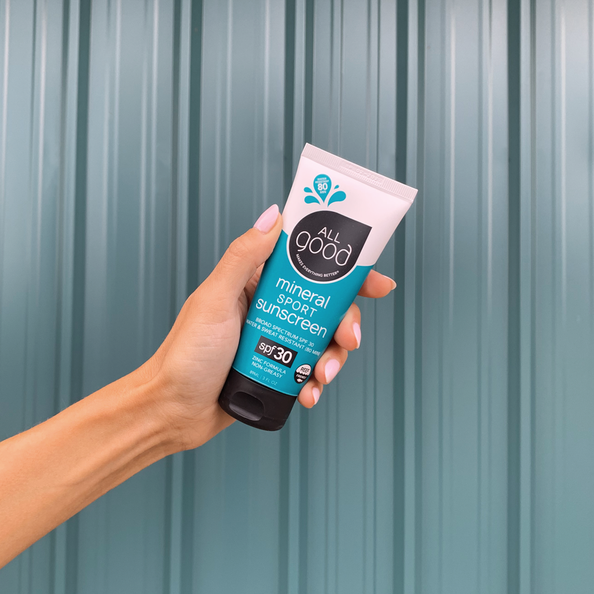 non-toxic mineral sunscreen in a recycled plastic refillable squeeze tube