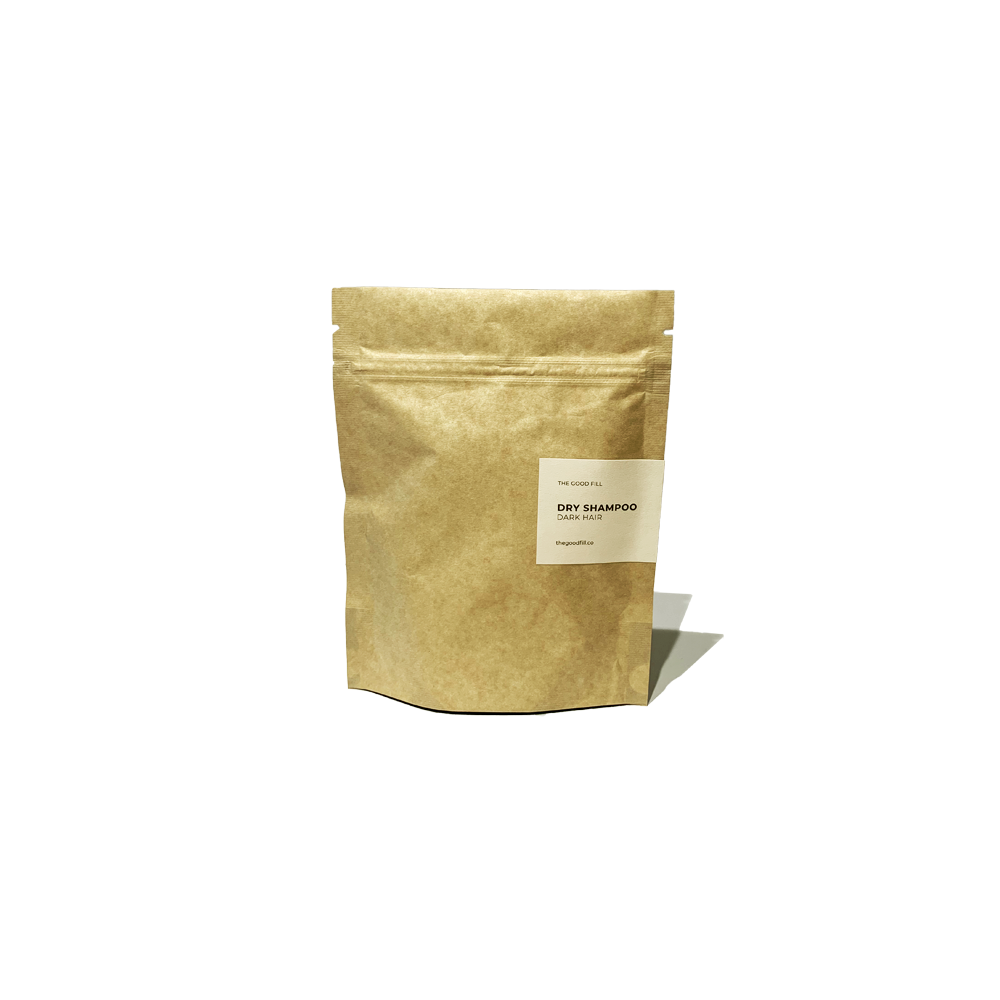 Product image of a 4oz compostable paper packet for zero waste dry shampoo refills.