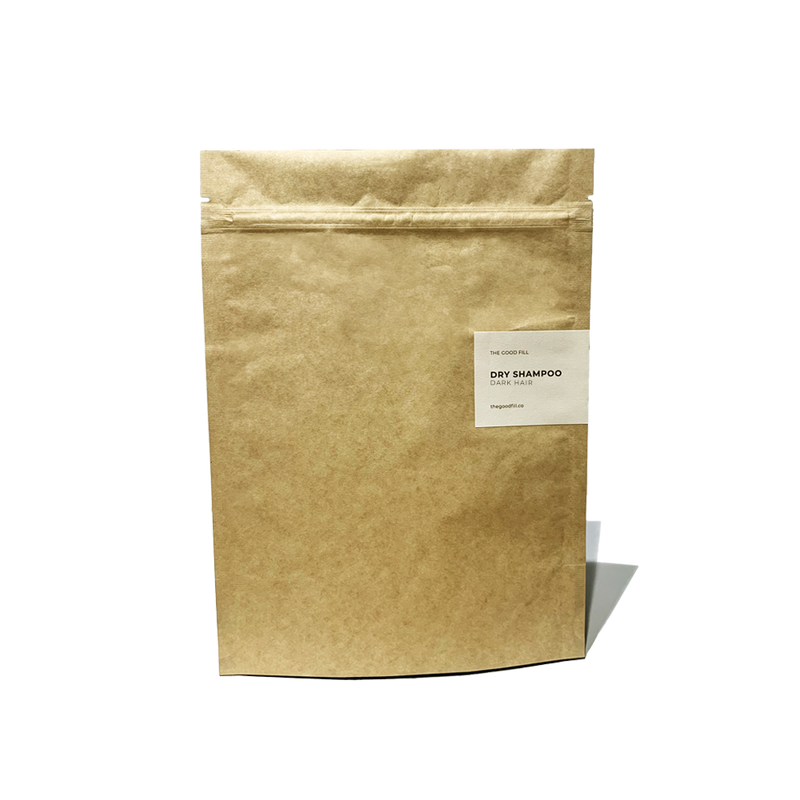 Product image of an 8oz compostable paper packet for zero waste dry shampoo refills.