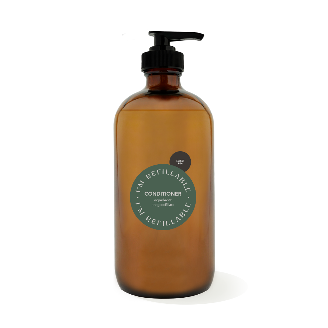 16oz glass amber bottle with a black pump top for zero waste sweet pea conditioner refills.