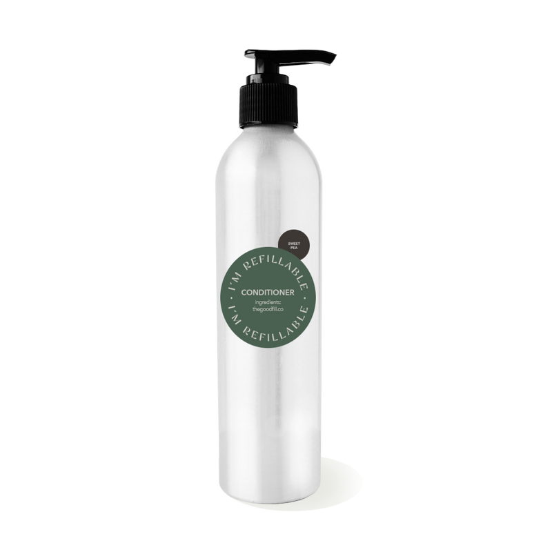 9oz aluminum bottle with a black pump top for zero waste sweet pea conditioner refills.