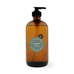 16oz glass amber bottle with a black pump top for zero waste sweet pea shampoo refills.