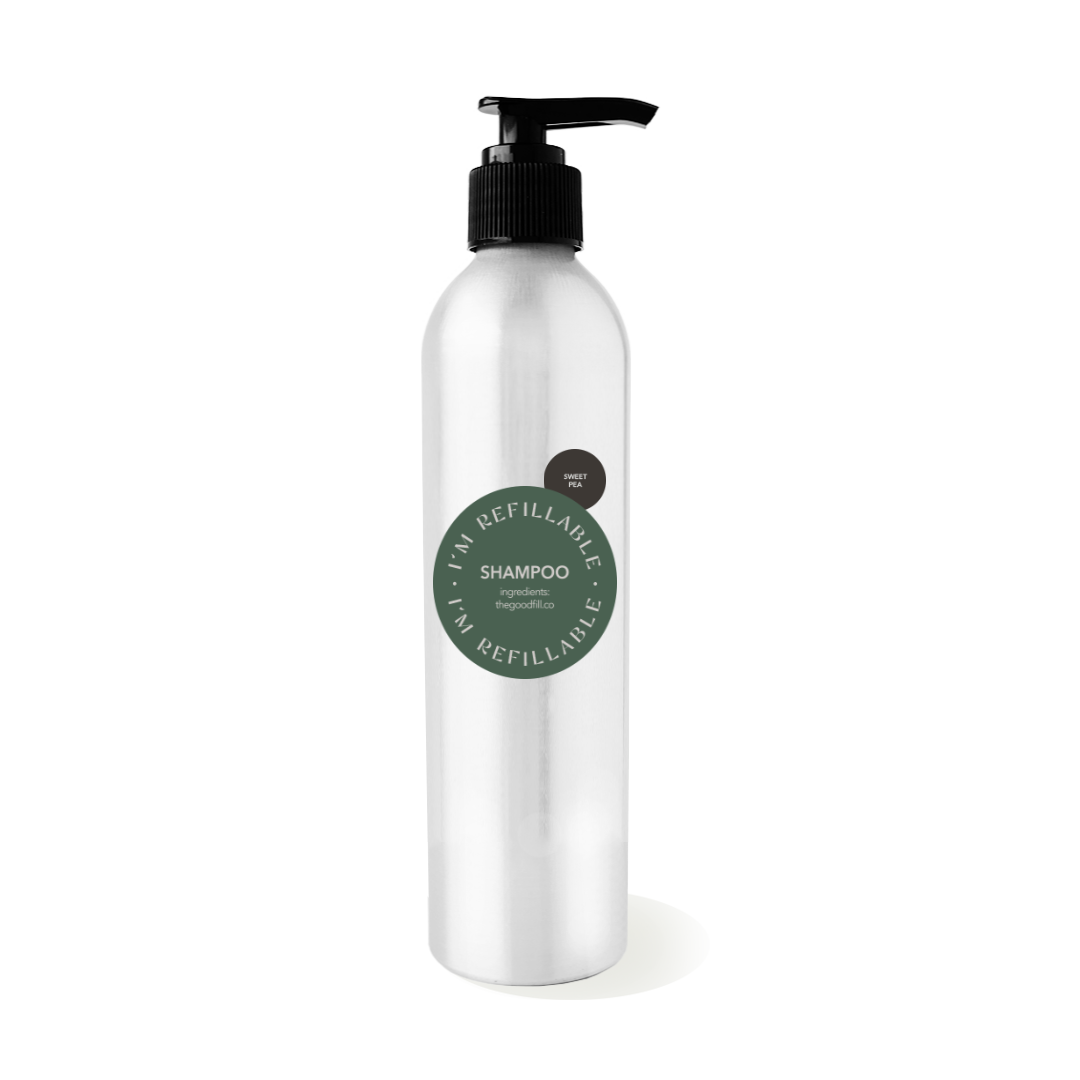 9oz aluminum bottle with a black pump top for zero waste sweet pea shampoo refills.