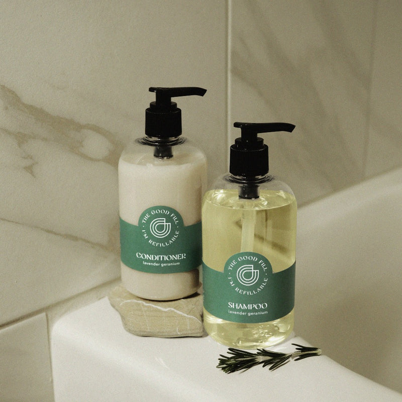 Shampoo and conditioner refills in recycled, refillable plastic pump bottles.