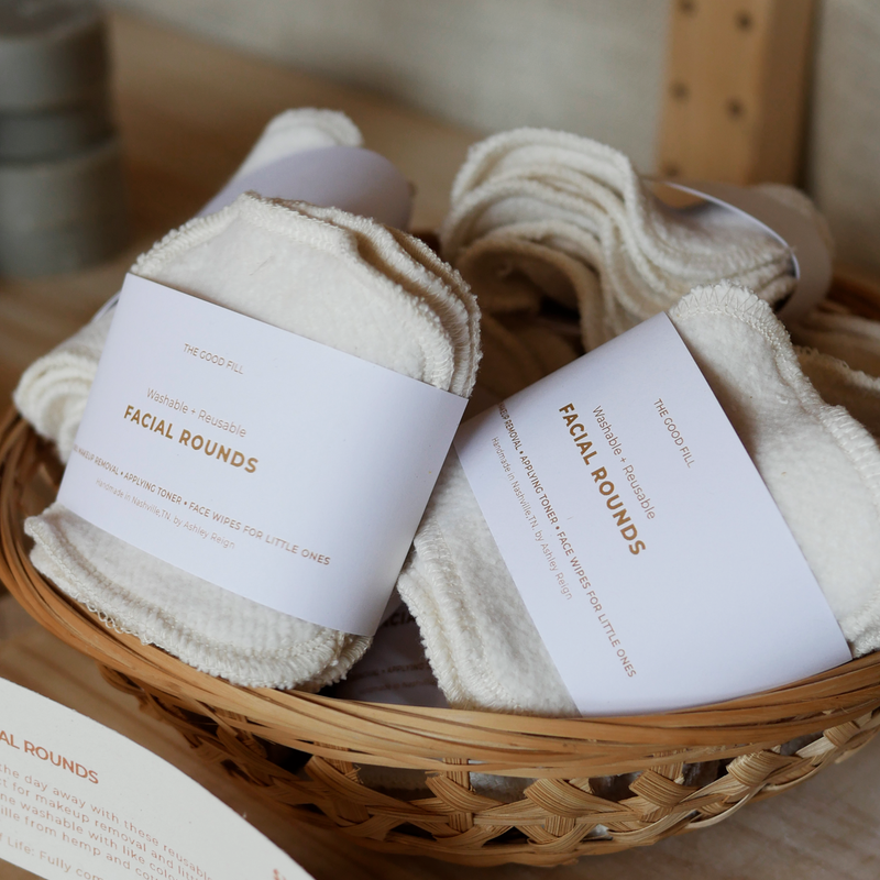 A five pack of natural white cotton facial rounds.