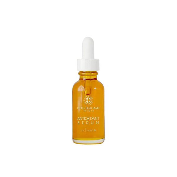 1oz. antioxidant serum in a clear glass bottle with a white dropper top..