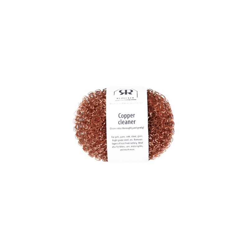 two pack of round copper scrubbers with small paper wrapper