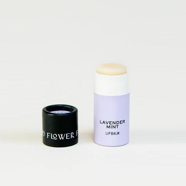 All natural Lavender Mint Lip Balm in a 0.25 oz eco-friendly biodegradable cardboard tube.