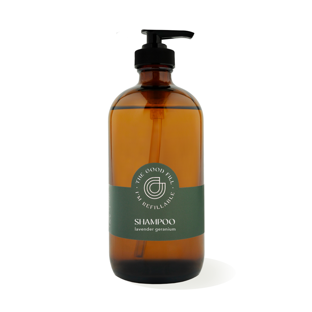 16oz glass amber bottle with a black pump top for zero waste lavender geranium shampoo refills.