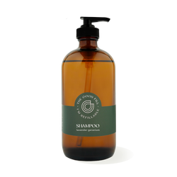 16oz glass amber bottle with a black pump top for zero waste lavender geranium shampoo refills.