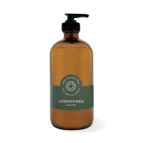 16oz glass amber bottle with a black pump top for zero waste unscented conditioner refills.