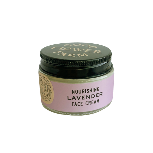 moisturizing lavender face cream in a 1oz. glass jar and a black plastic lid.